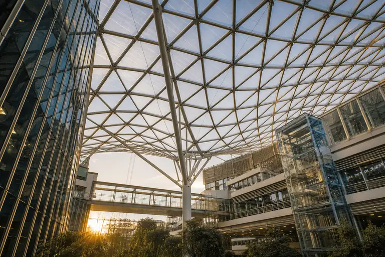 Atrium under a luminous ETFE air cushion roof — Commercial Building ETFE Roofing