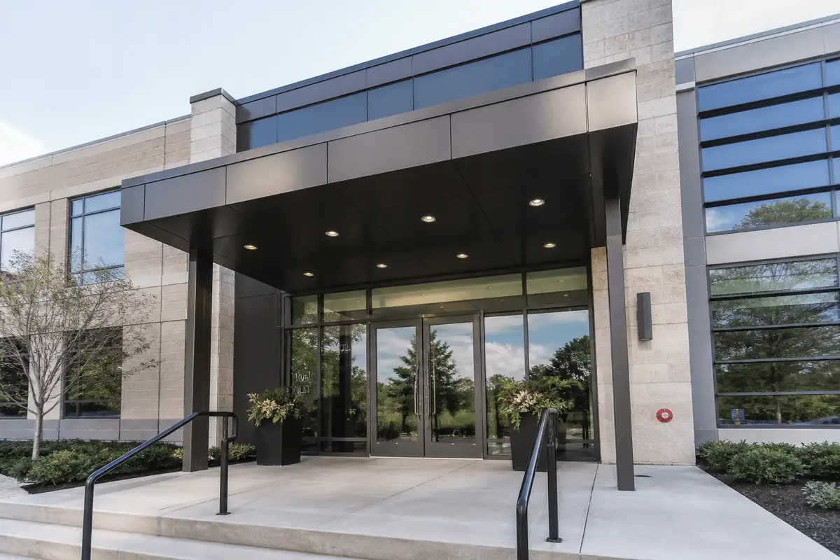 Commercial building entrance with elegant ETFE canopy — Commercial Building ETFE Roofing