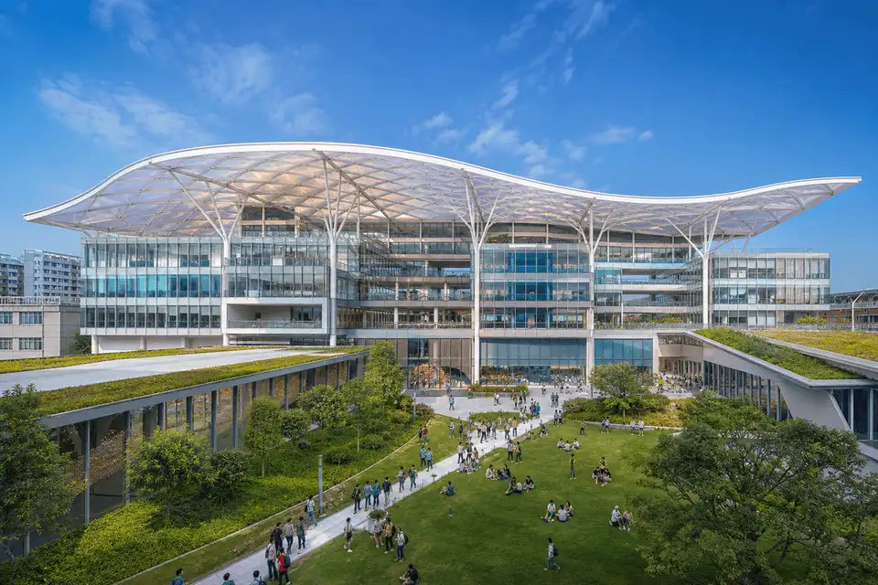 Exterior silhouette of a modern corporate headquarters ETFE roof — Corporate Headquarters ETFE Roofing systems