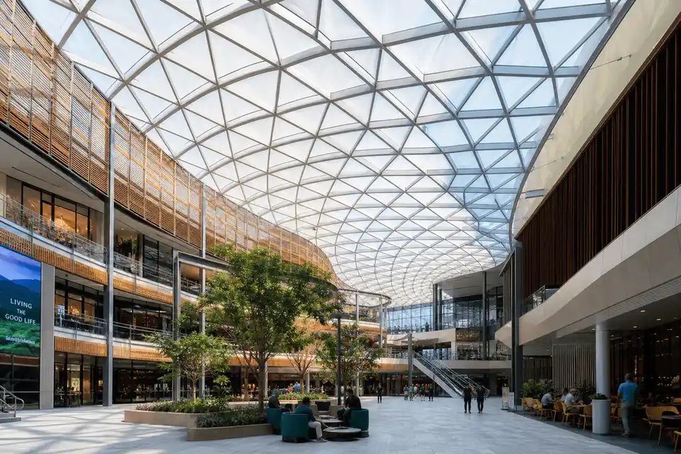 Corporate interior looking up at a daylit ETFE cushion roof — Corporate Headquarters ETFE Roofing systems