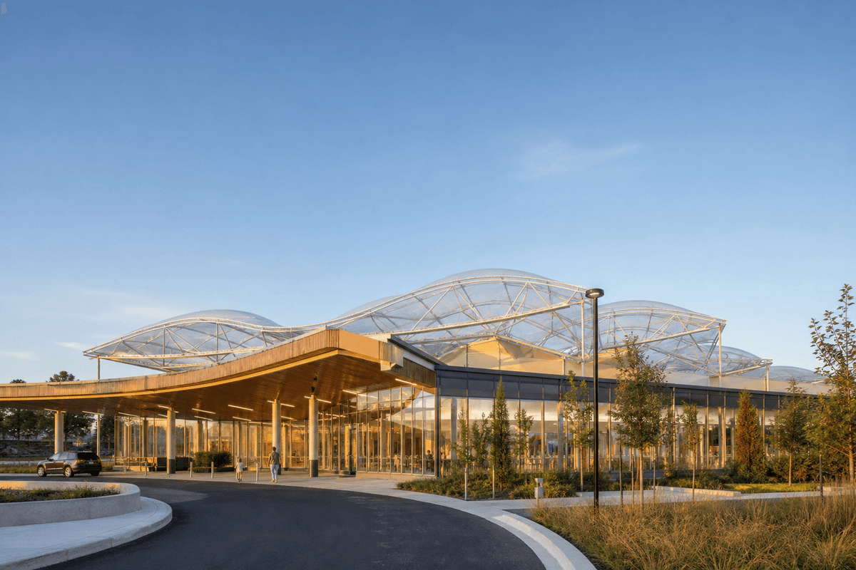 Exterior of a modern healthcare facility with ETFE roof