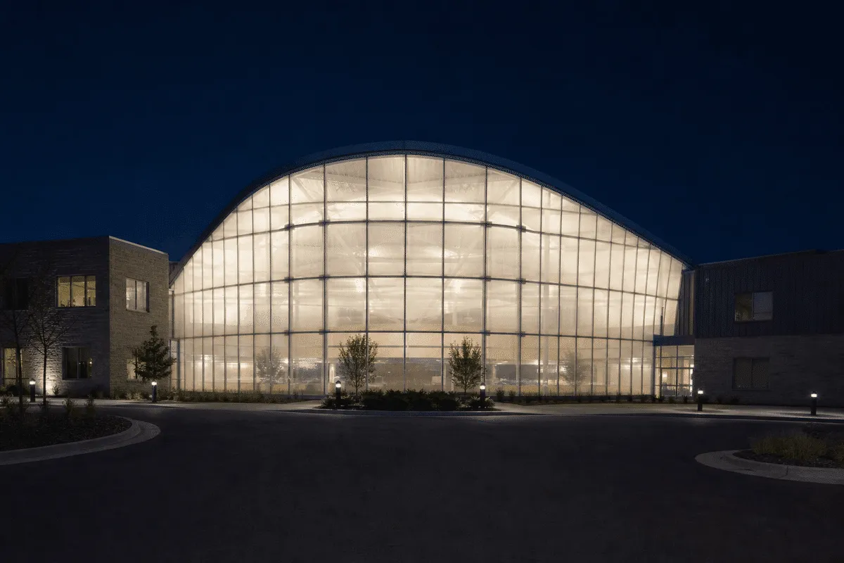 ETFE roof glowing softly at night — Healthcare Facility ETFE Roofing