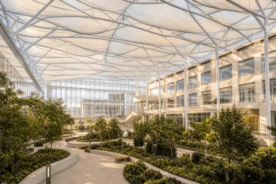 Daylit modern hospital healthcare building with translucent ETFE daylight roof atrium — Hospital ETFE Roofing systems