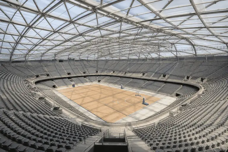 Natural daylight washing an indoor sports arena bowl through an ETFE roof — Indoor Sports Arena ETFE Roofing systems