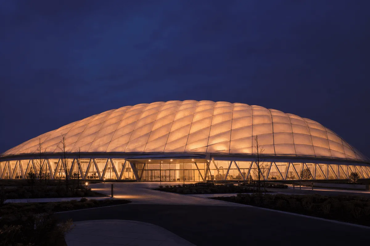 ETFE roof glowing softly at night — Indoor Sports Arena ETFE Roofing