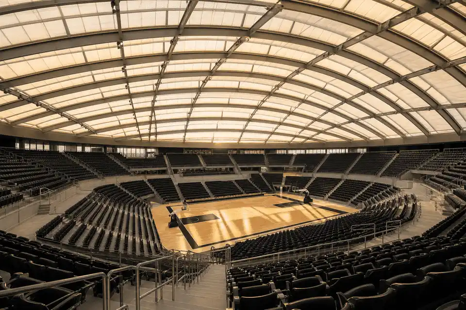 Daylit modern indoor sports arena with translucent ETFE roof — Indoor Sports Arena ETFE Roofing systems