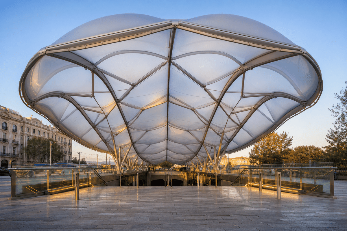 Freeform curved ETFE cushion field on a metro station roof