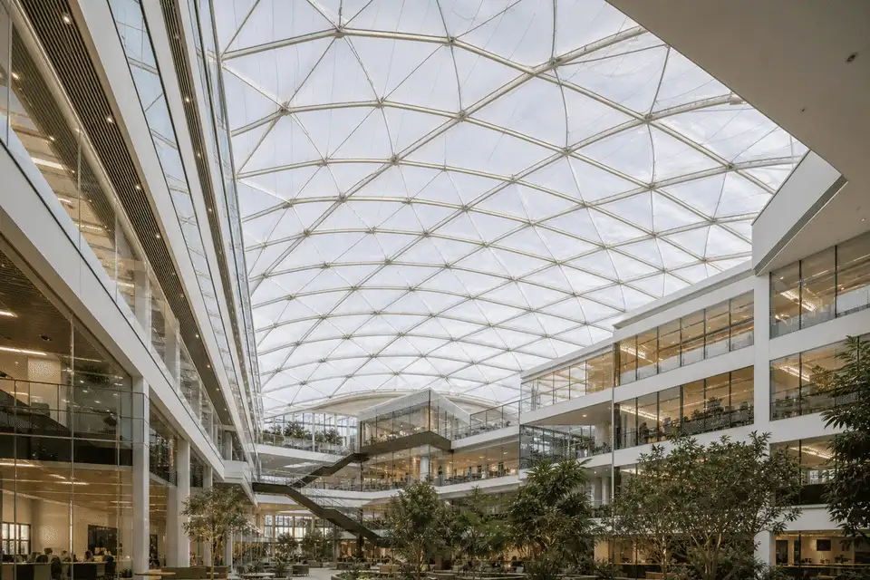 Exterior silhouette of a modern office building ETFE roof — Office Building ETFE Roofing systems