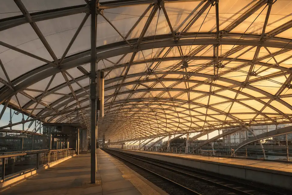 Railway interior looking up at a daylit ETFE cushion roof — Railway Station ETFE Roofing systems