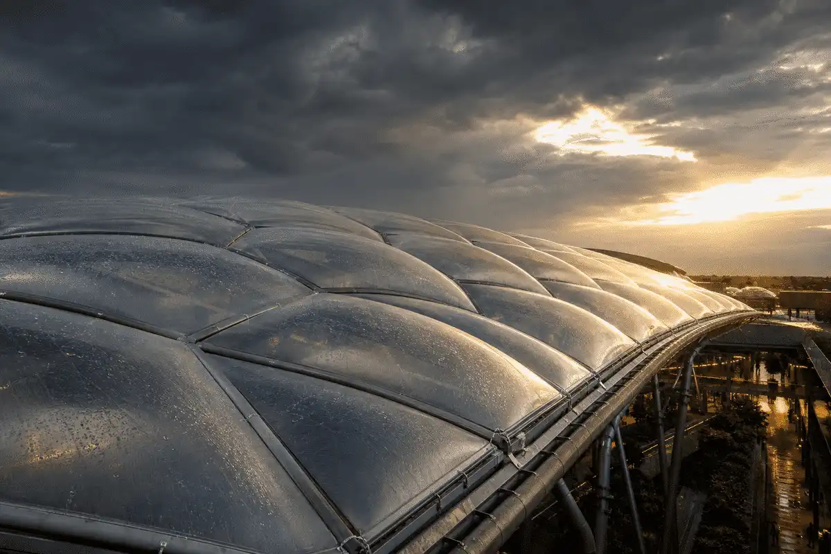 ETFE mall roof under storm lighting and rain — Shopping Mall ETFE Roofing