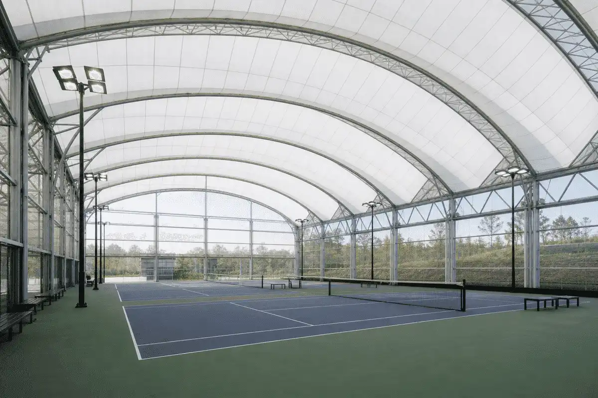Indoor sports courts under sweeping ETFE roof — Sports Complex ETFE Roofing