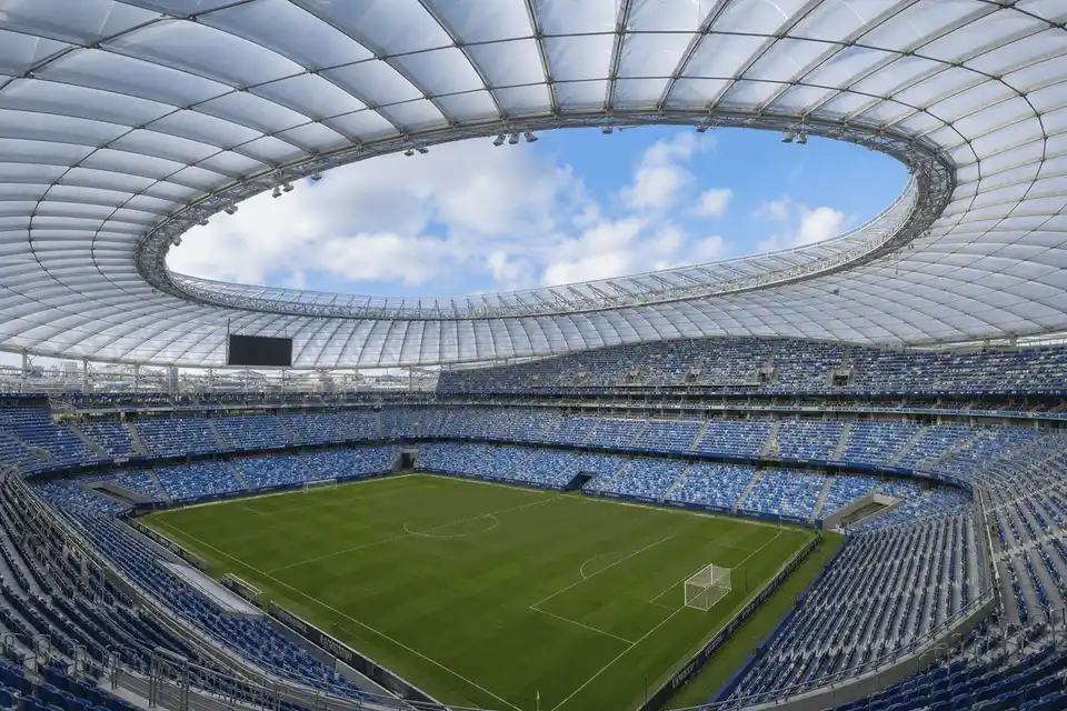 Long-span translucent ETFE roof over a sports stadium seating bowl — Stadium ETFE Roofing systems