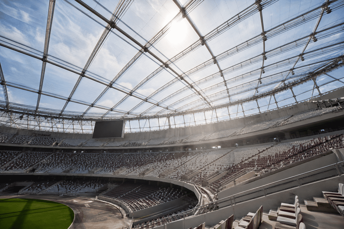 Natural daylight washing stadium seating through an ETFE roof