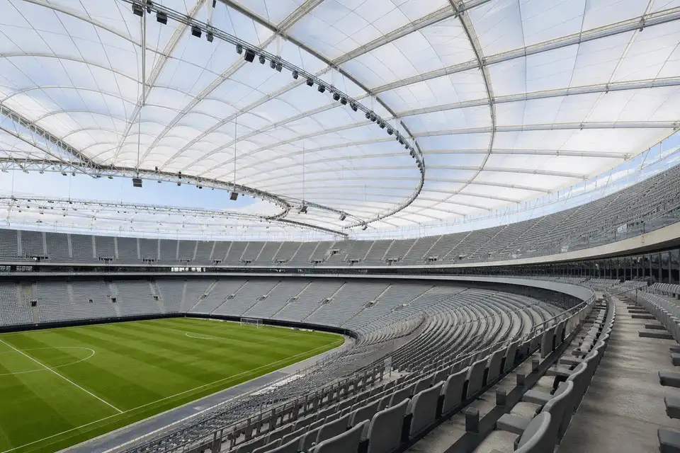 Spectator stands with a translucent ETFE ceiling plane — Stadium ETFE Roofing