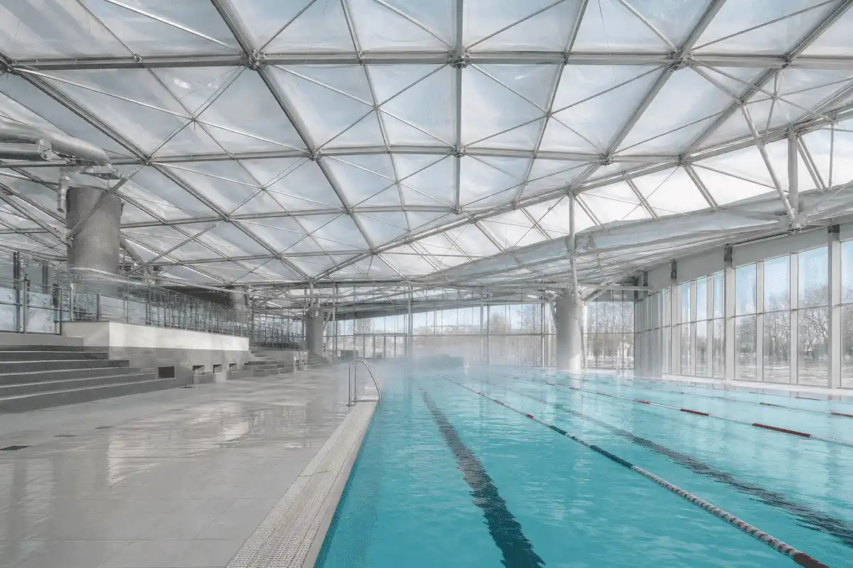 Daylit indoor aquatic centre swimming pool with translucent ETFE roof — Swimming Pool ETFE Roofing systems