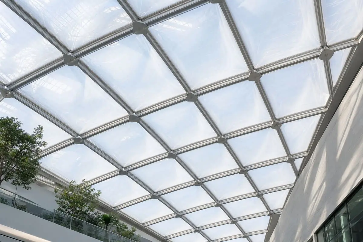 ETFE skylight roof flooding a modern atrium with daylight — ETFE film supplier India — ETFE film supplier India