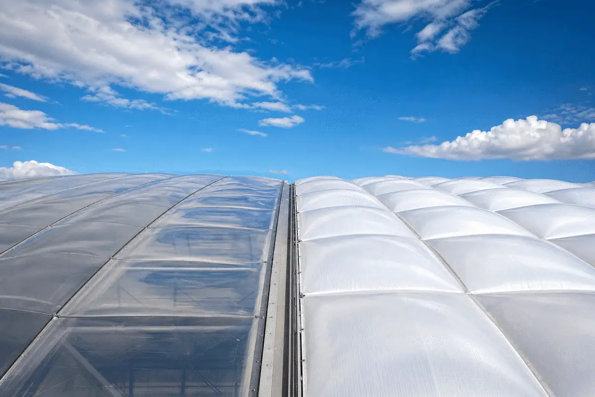 Inflated triple-layer cushion beside flat single ETFE foil — ETFE technical guide — ETFE technical guide