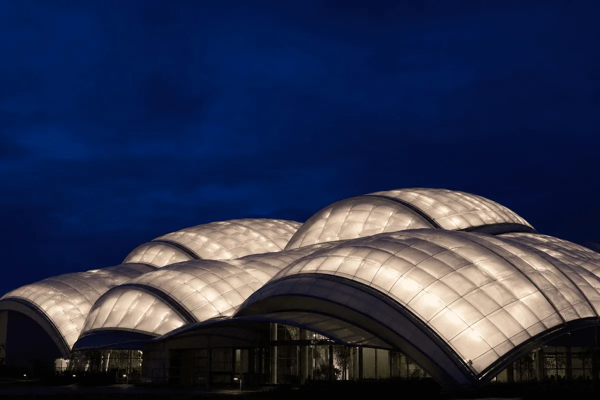 ETFE cushion modules craned onto steel roof structure — ETFE Air Cushion System