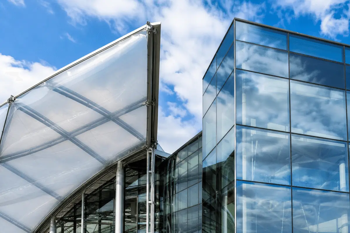 Atrium contrasting ETFE cushion roof with glass curtain wall — ETFE technical guide — ETFE technical guide