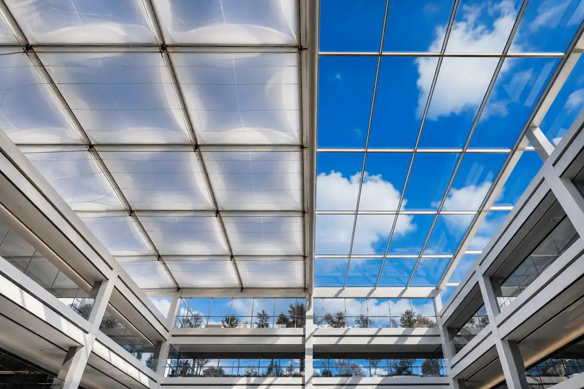 Twin pavilions comparing ETFE pillow roof and glass skylight — ETFE technical guide — ETFE technical guide
