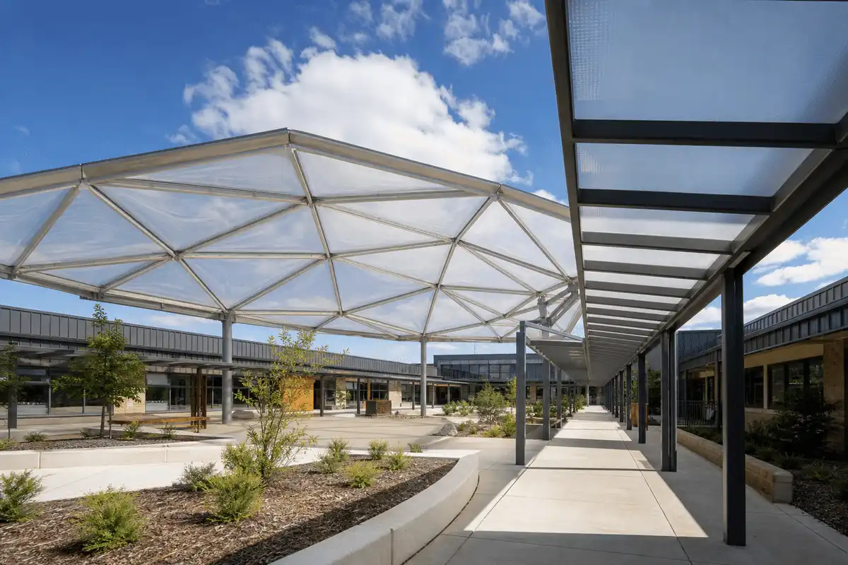 Sports hall interior comparing ETFE and polycarbonate skylights — ETFE technical guide — ETFE technical guide