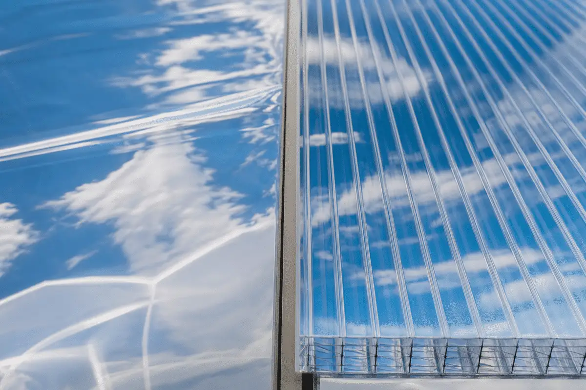 Greenhouse comparing ETFE foil and polycarbonate twin-wall roof — ETFE technical guide — ETFE technical guide