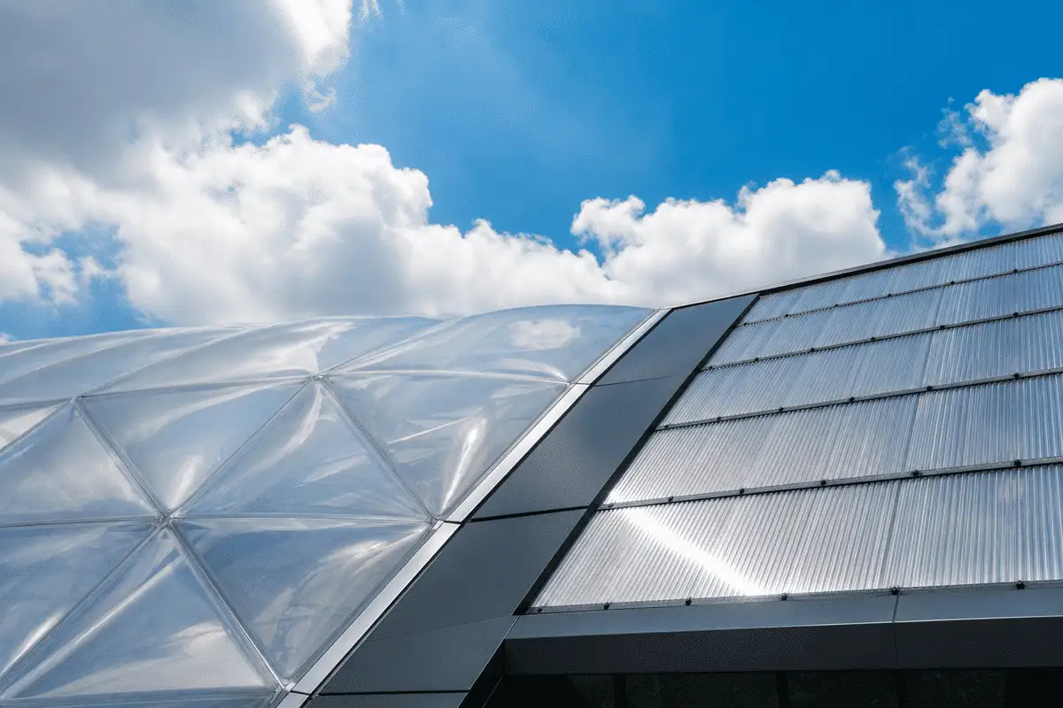 ETFE cushion canopy contrasted with rigid polycarbonate panel roof — ETFE technical guide — ETFE technical guide